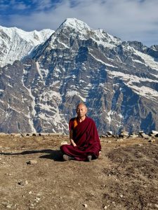 a monk mediating at mardi himal base camp